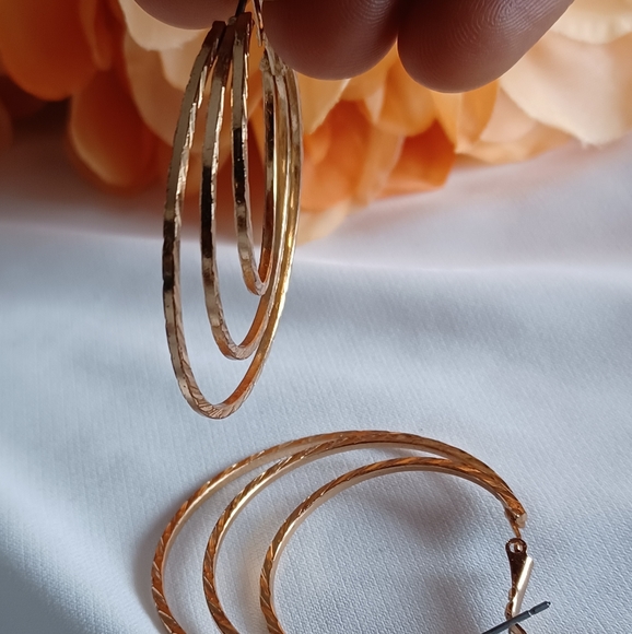 Golden Spiral Hoop Earrings - Picture 2 of 15